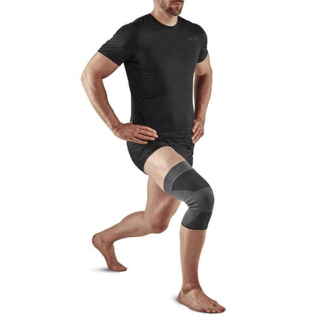 Opaska kompresyjna na staw kolanowy Mid Support Compression CEP unisex szara