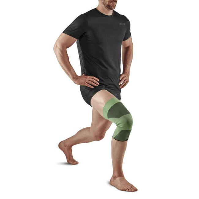Opaska kompresyjna na staw kolanowy Mid Support Compression CEP unisex zielona